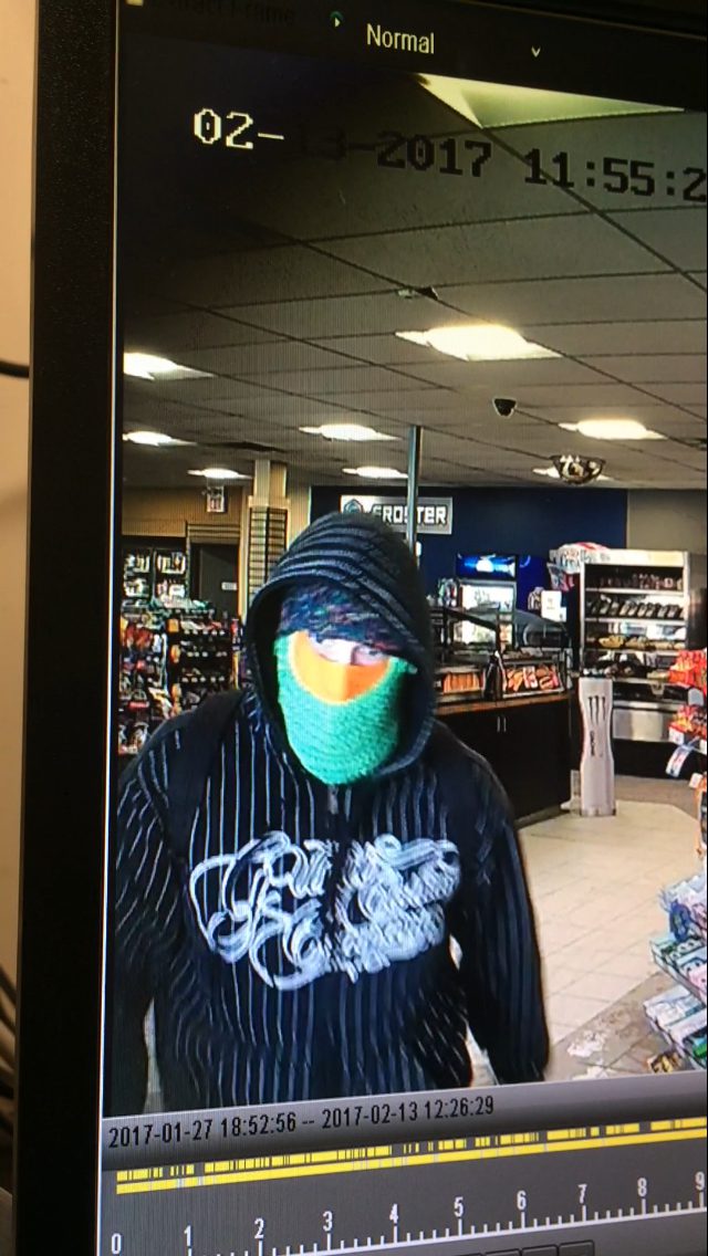 Police Search for Robbery Suspect