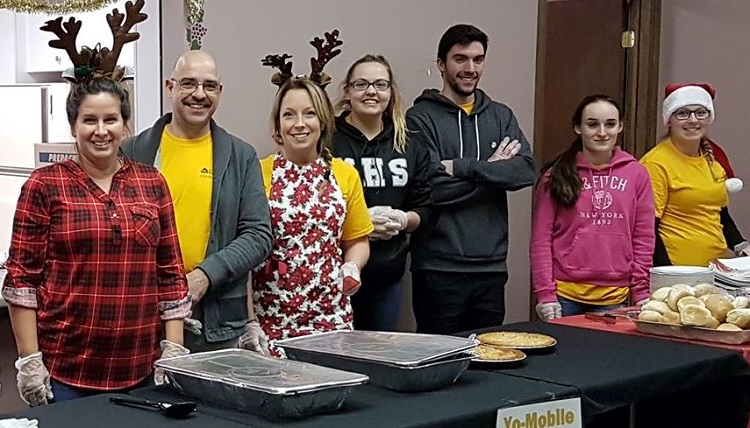 HUMANITARIANS SERVE XMAS DINNER TO NEEDY