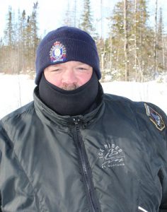 Timmins-Const.-Troy-Larose-in-snowmobile