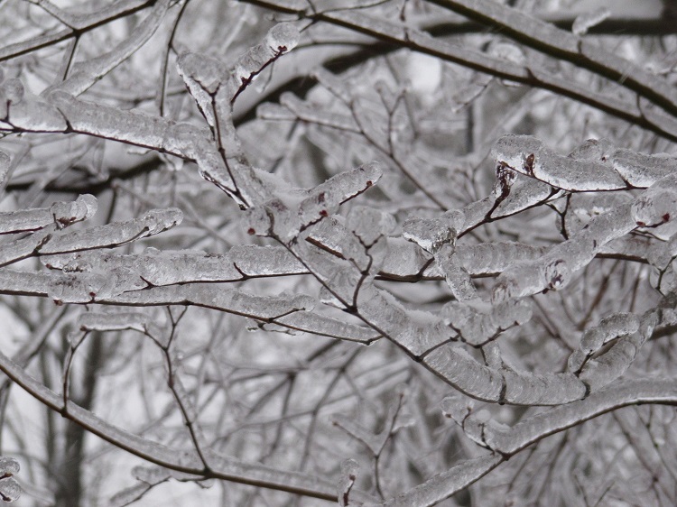 City crews sand for traction, scrape some ice away