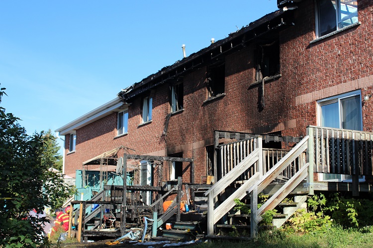 Flames fueled by natural gas damages three townhouses on MacLean Drive