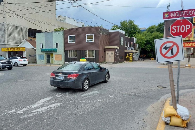The sign on Wilson Ave. says ‘No left turn’