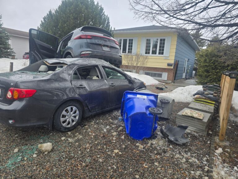 Car becomes airborne, driver charged